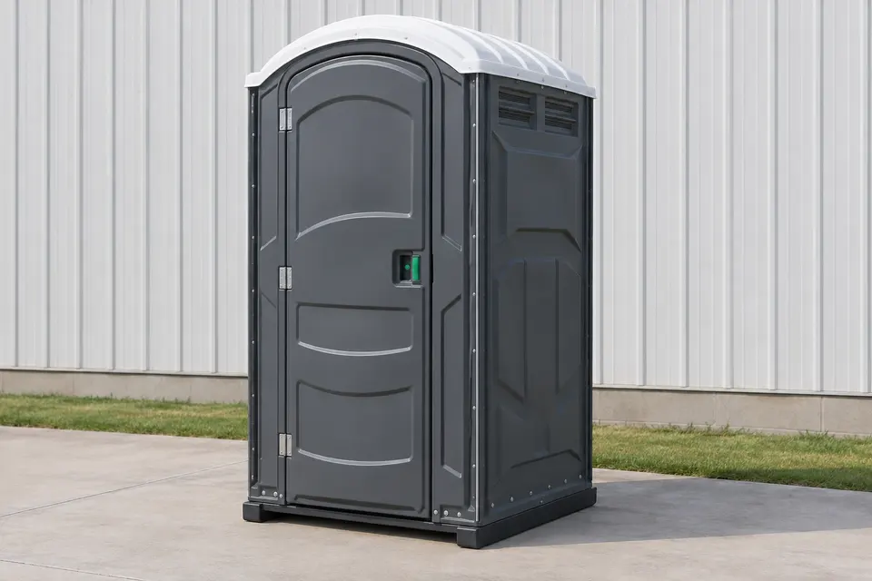 Standard portable toilet with a closed door